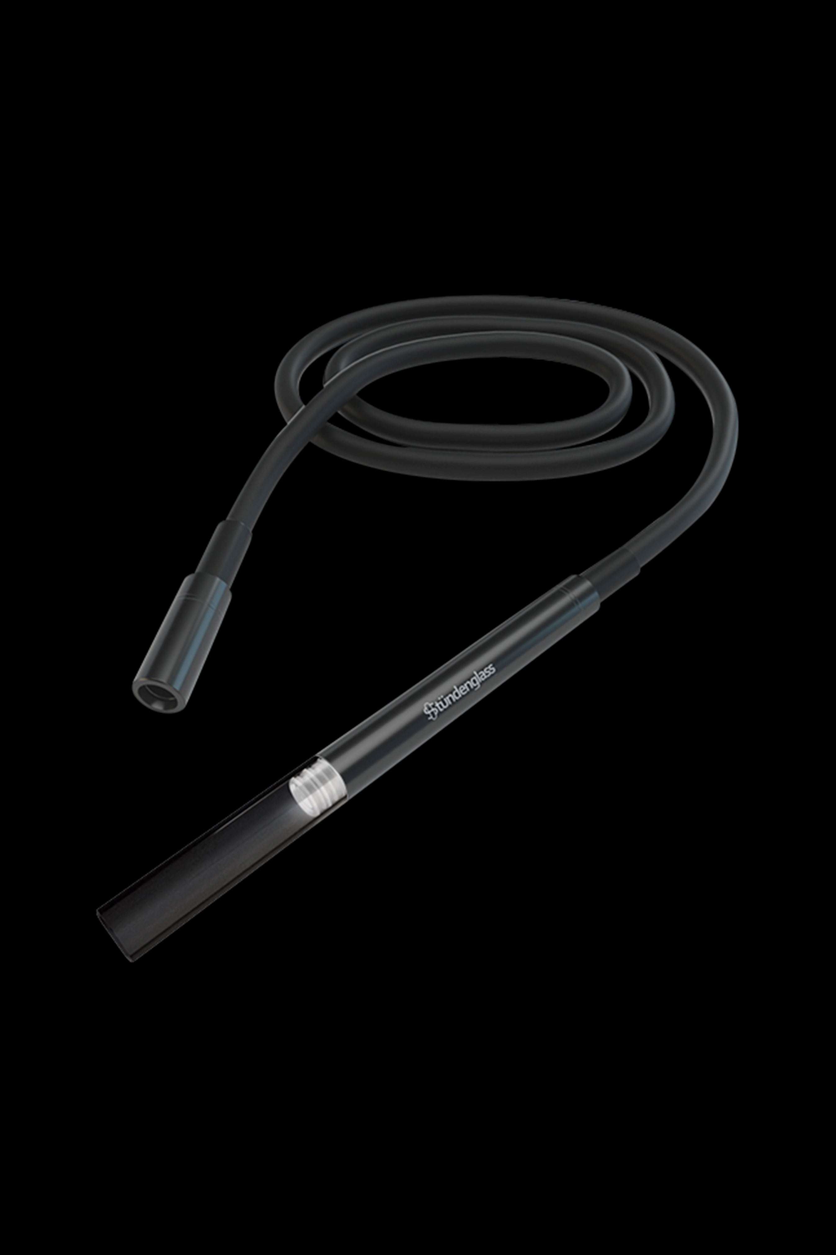 Clear glass cannabis oil rig with coiled tubing against a black background.