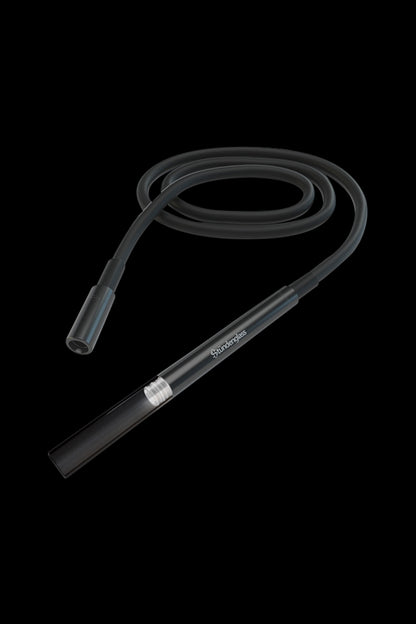 Clear glass cannabis oil rig with coiled tubing against a black background.