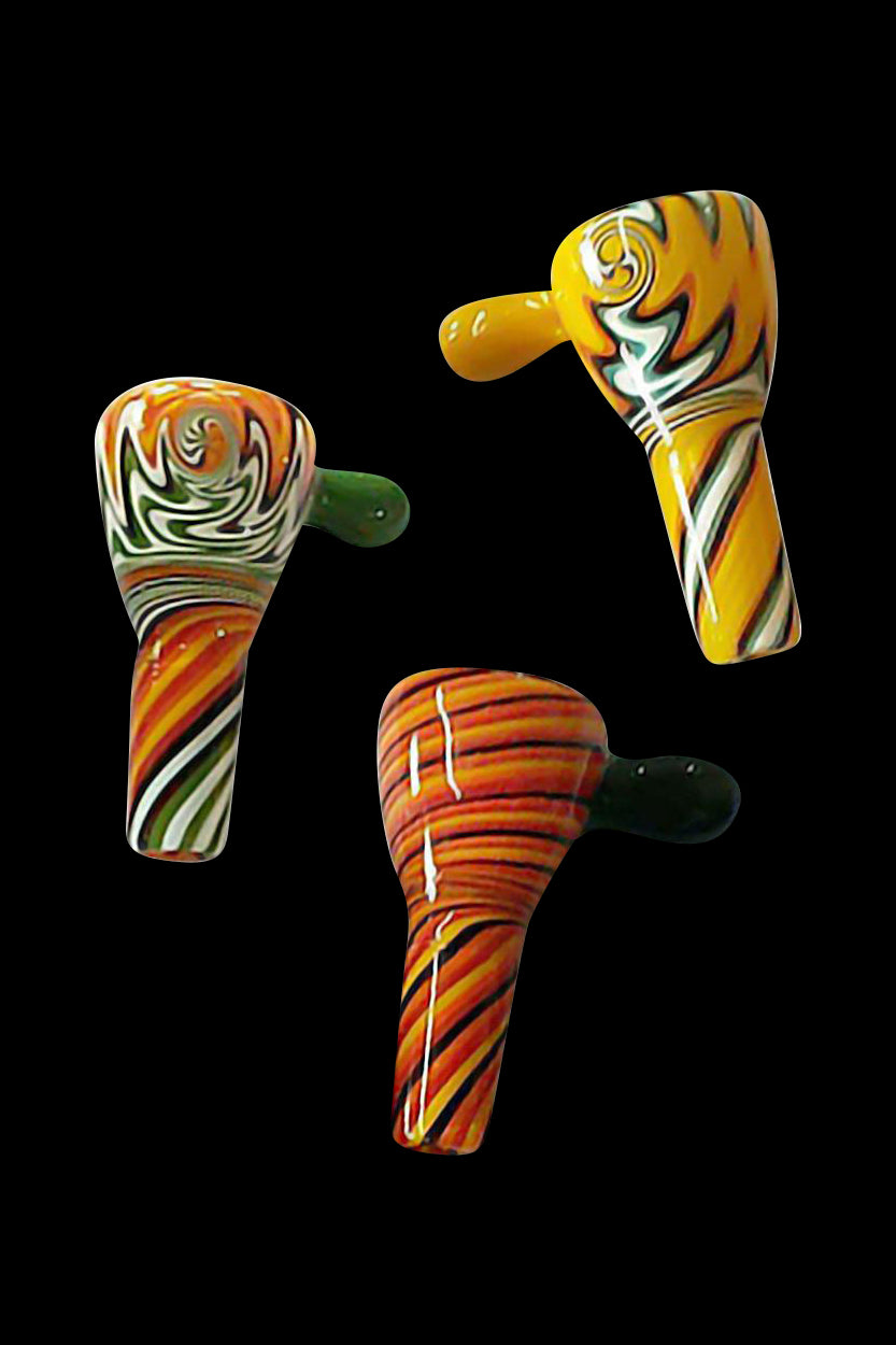 Hand-blown glass pipes with colorful swirling patterns against a black background.