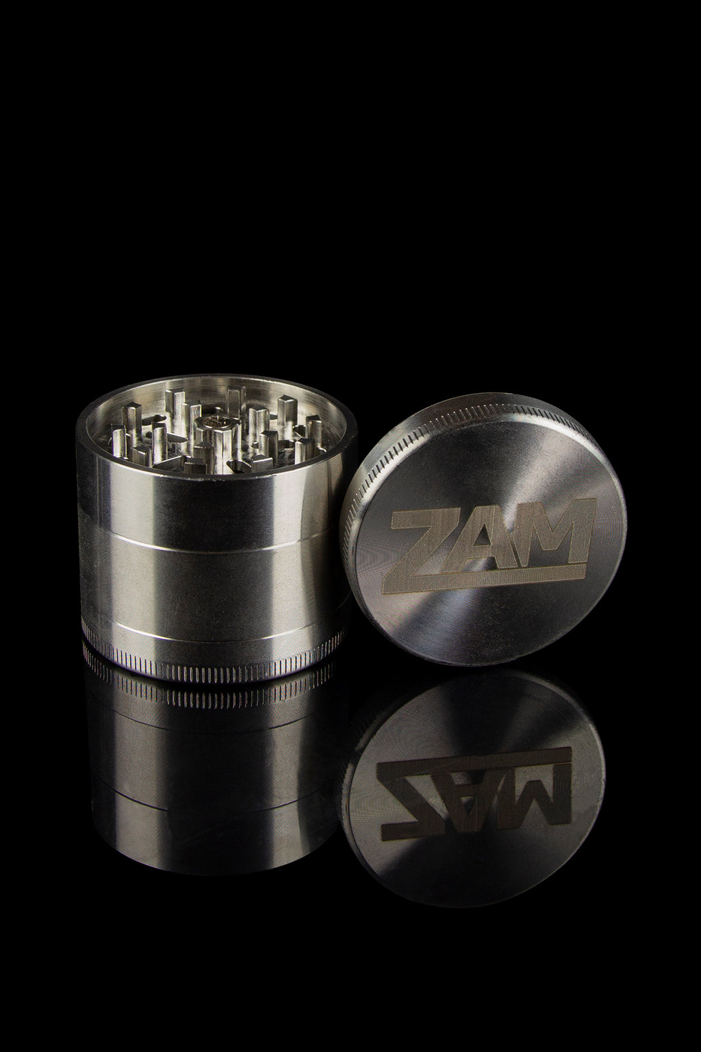 https://www.smokecartel.com/cdn/shop/products/zam-stainless-steel-4-piece-grinder_detail-view_1024x.jpg?v=1650898247